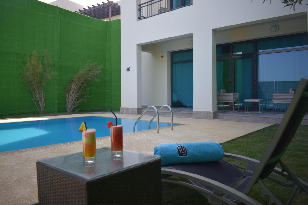 Retaj Salwa Resort & Spa Al Rayyan Exterior photo The swimming pool at the hotel